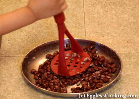 Mash the black beans