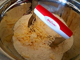 Using a pastry blender, mix well.