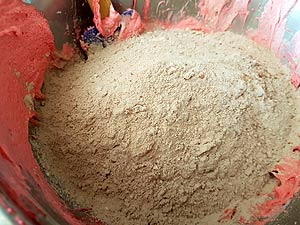 6) Stir in flour mix into colored wet-mix.