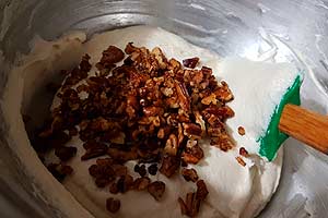 3. Add remaining toasted pecans.