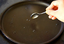 Preheat the pan with drops of coconut oil Preheat the pan with drops of coconut oil