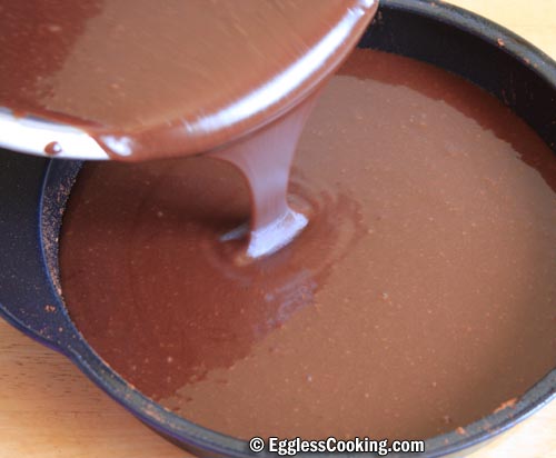 Pour the cake batter to the baking pan.