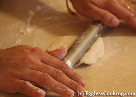 Vegetarian Empanadas:Now flatten the dough ball