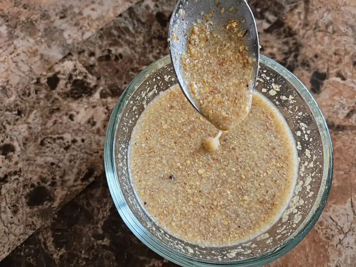 Flaxseed meal and water mixed in a small bowl to make a flax egg