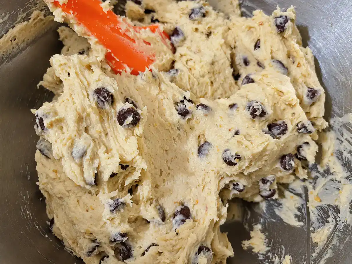 Chocolate chips evenly folded into soft eggless chocolate chip cookie dough