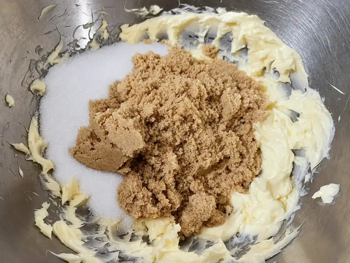 Brown sugar and granulated sugar added to softened butter