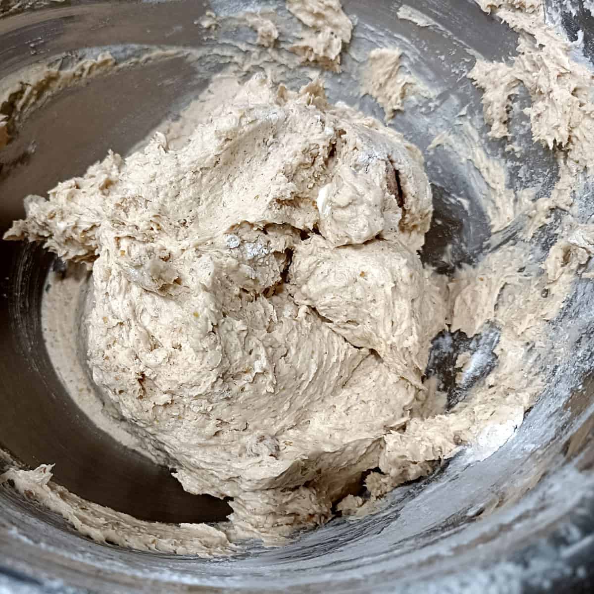 Mix into dough: Wet and dry ingredients are mixed just until a thick, cohesive dough forms.